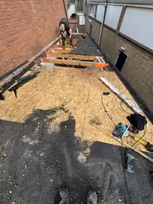 Plat dak bitumen compleet gerenoveerd.jpg