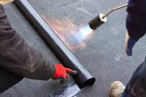 Bitumen plat dak vervangen.jpg