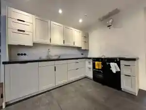 Praktische keukenachterwand uitgevoerd in wandpanelen..jpg