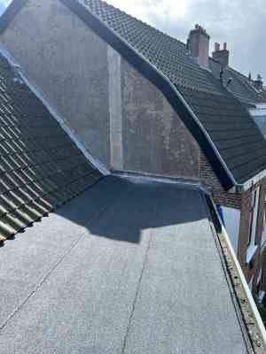schoorsteenveger_almere_mees_aan_huis_2.jpg