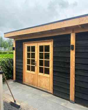 Tuinhuis met praktijk ruimte.jpg