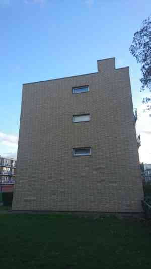 Kopgevel Charlois voor en na.jpg