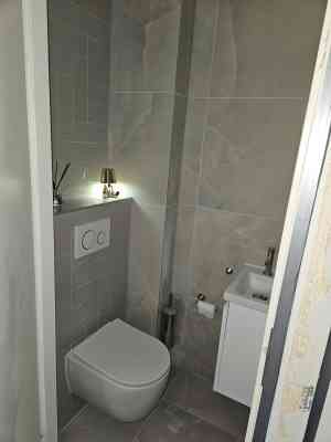 Tijdloze Elegantie: Complete Badkamertransformatie met Luxe Details.jpg