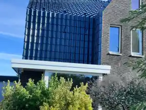 Reinigen beplating/houtwerk en hellend dak.jpg