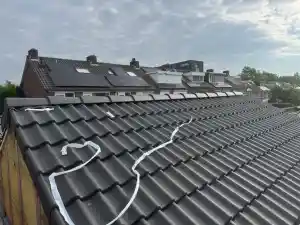 Dak vernieuwd met dampopen folie, tengels en panlatten.jpg
