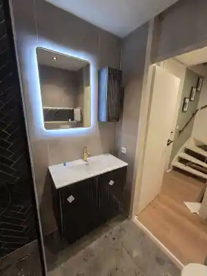Volledige badkamerrenovatie: van leidingwerk tot luxe LED-afwerking.jpg