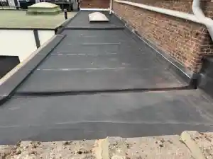 platte daken voor Gemeente Aartselaar.jpg