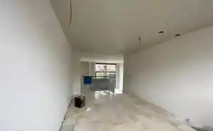 Renovatie stukadoren woning woonkamer .jpg