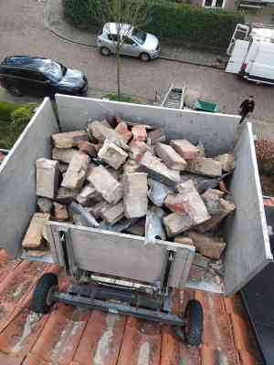 Schoorsteen verwijderd en nieuwe dakdoorvoeren geplaatst.jpg