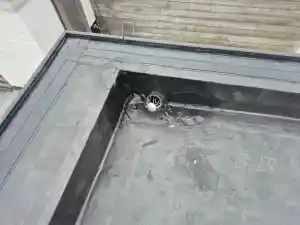 Renovatie van een plat dak boven de aanbouw van de woning.jpg