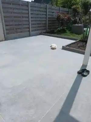 Uitbreken en herplaatsen van terras en afwatering.jpg