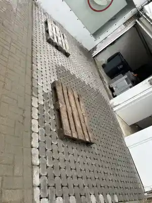 Uitbreken en herplaatsen oprit.jpg