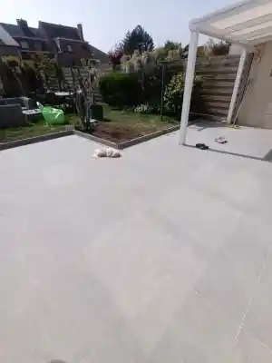 Uitbreken en herplaatsen van terras en afwatering.jpg