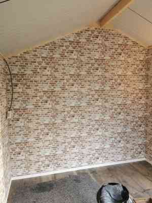 behangwerk van een nieuw tuinhuis.jpg